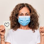 Dame mit Mundschutz. Foto: Adobe Stock/Krankenimages.com